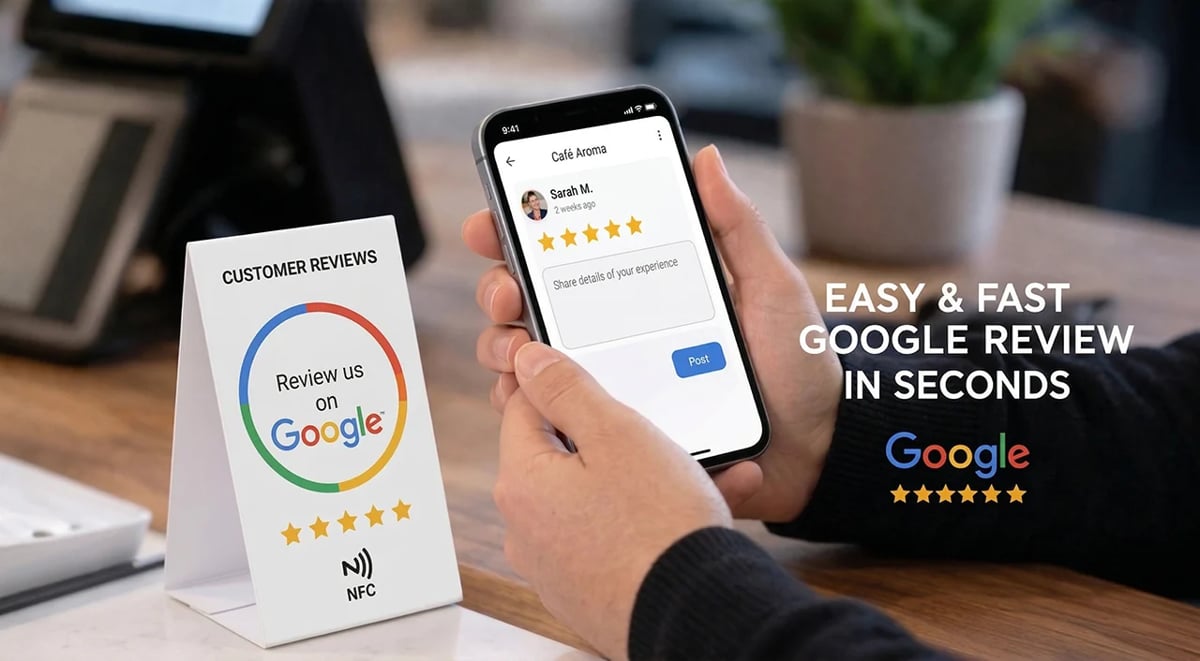 Person holding smartphone displaying Google review interface with 5-star rating, table tent card showing customer review prompt with Google logo and stars