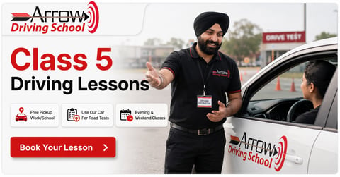 Instructor teaching Class 5 driving lesson at Arrow Driving School. Man in black uniform gestures to student in white car.